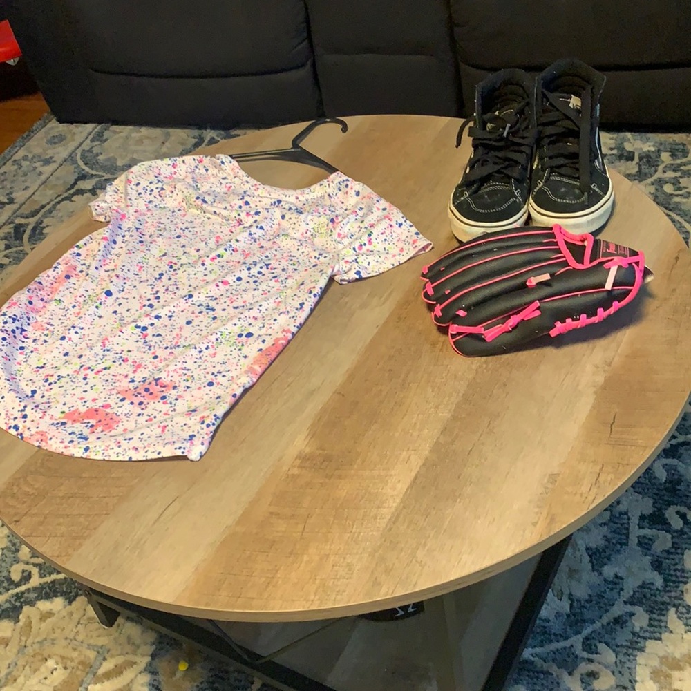 Girls outfit with shirt shoes and a baseball glove